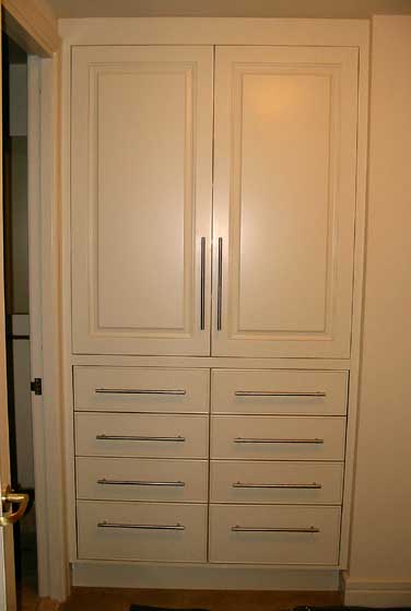 Custom Closet Cabinetry with Stainless Bar Pulls